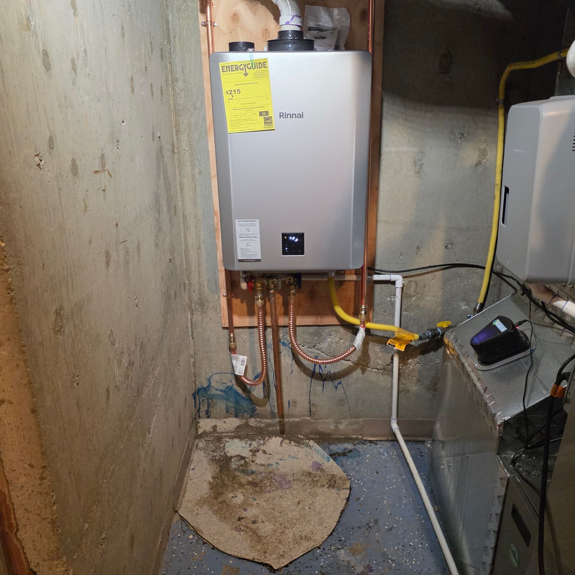 Gallery photos for Old Tank Water Heater Out, Rinnai Tankless Unit In: Image #1