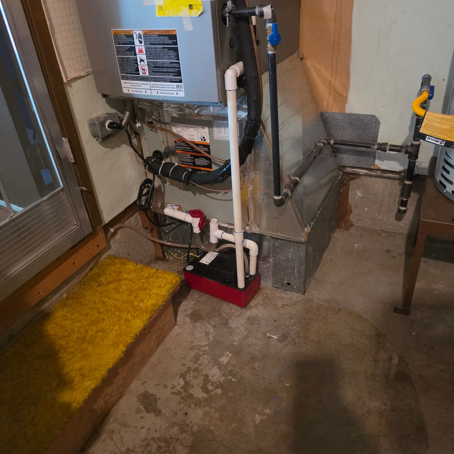 Garage Water Leak Traced to a Failing Condensate Pump in Tualatin image